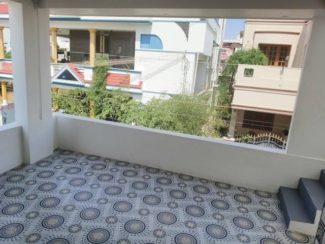 Balcony with outdoor seating and city view